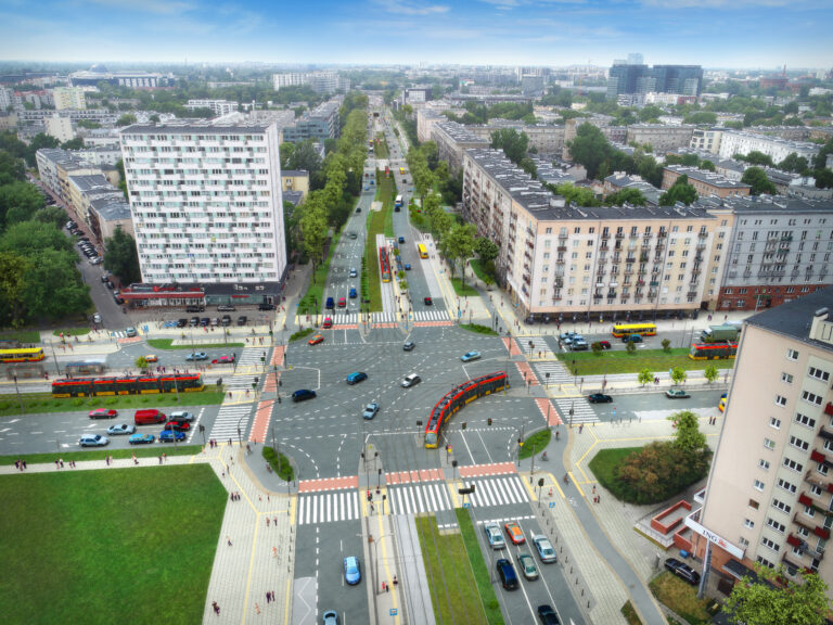 Wizualizacja przebudowanego skrzyżowania ulic Bitwy Warszawskiej i Grójeckiej. Widać skręccający tramwaj, jadące autobusy, samochody.